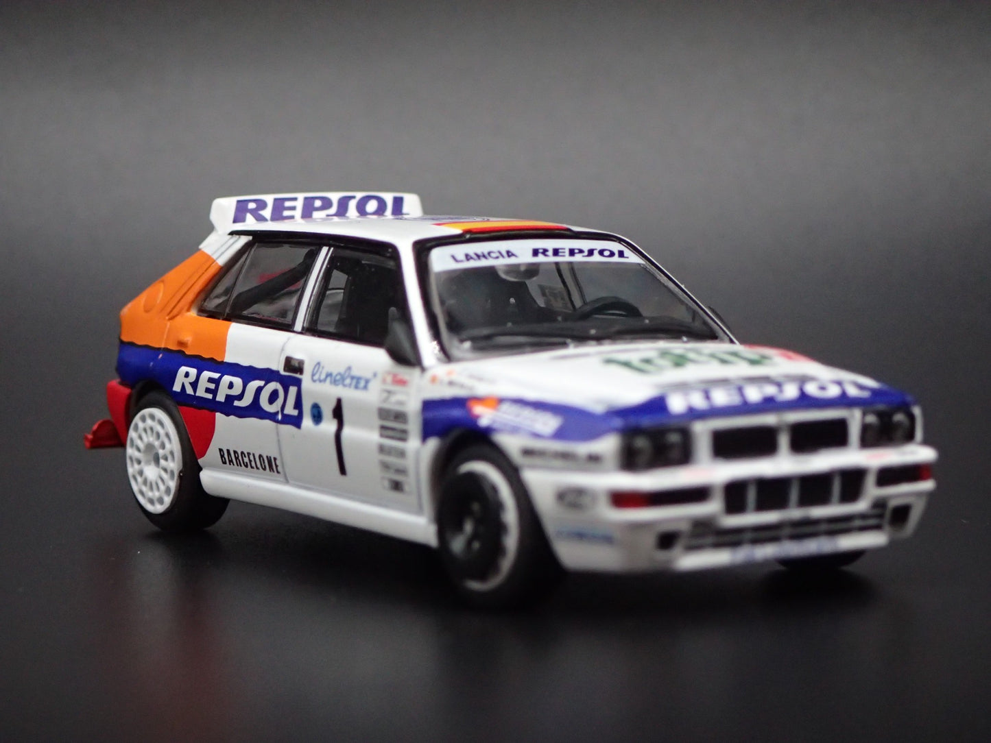 LANCIA DELTA HF INTEGRALE EVOLUZIONE #1 REPSOL RACE 1:64 SCALE DIECAST MODEL CAR