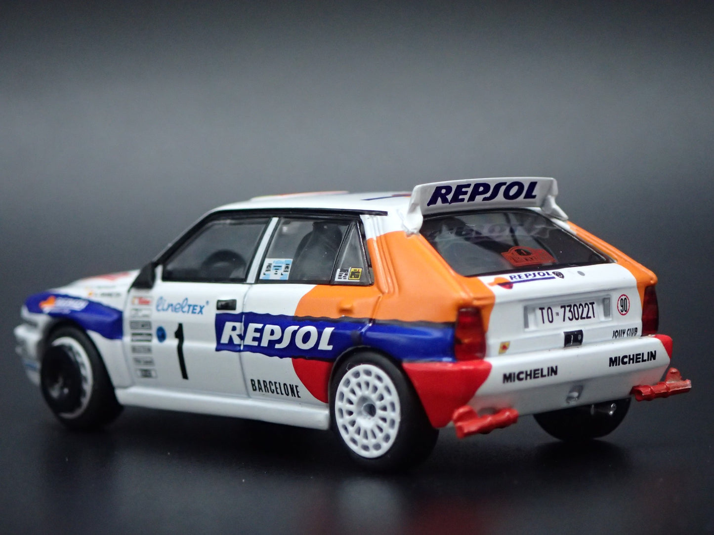 LANCIA DELTA HF INTEGRALE EVOLUZIONE #1 REPSOL RACE 1:64 SCALE DIECAST MODEL CAR