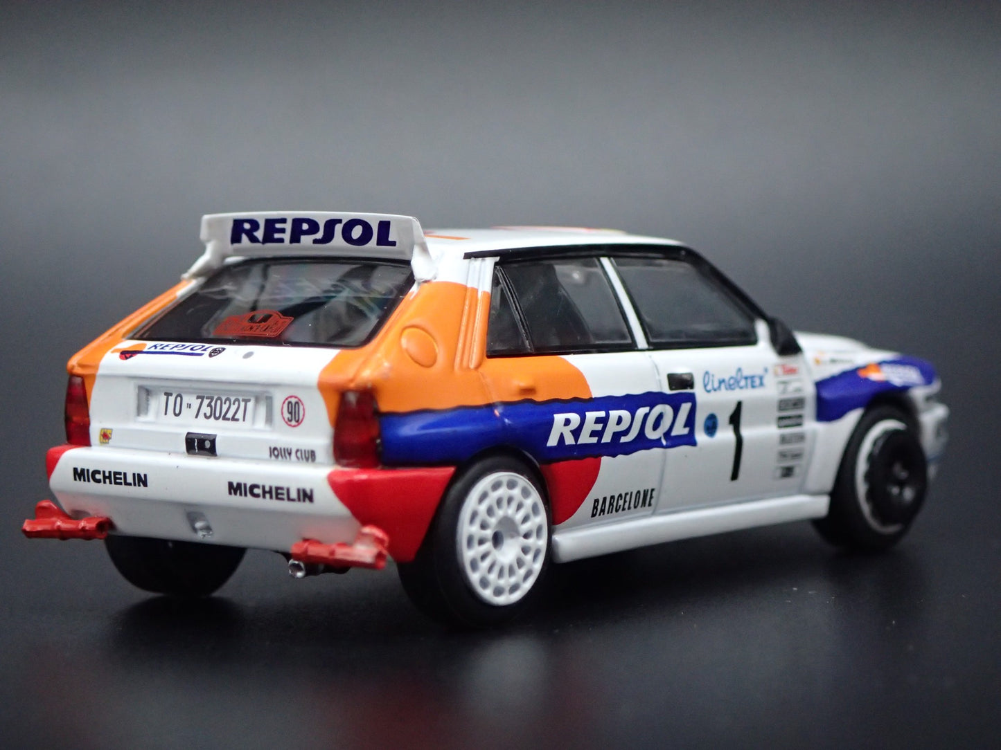 LANCIA DELTA HF INTEGRALE EVOLUZIONE #1 REPSOL RACE 1:64 SCALE DIECAST MODEL CAR