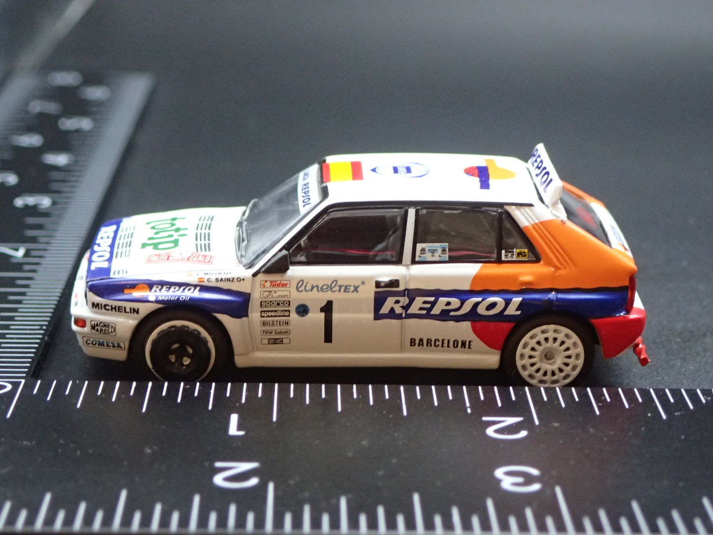 LANCIA DELTA HF INTEGRALE EVOLUZIONE #1 REPSOL RACE 1:64 SCALE DIECAST MODEL CAR