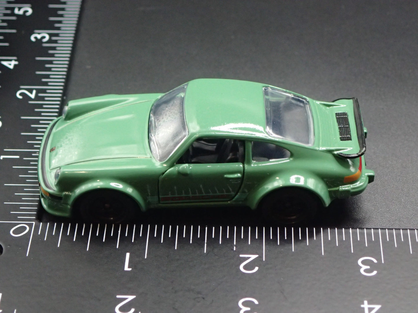 1976-1977 PORSCHE 934 GREEN 1:64 SCALE COLLECTIBLE DIORAMA DIECAST MODEL CAR