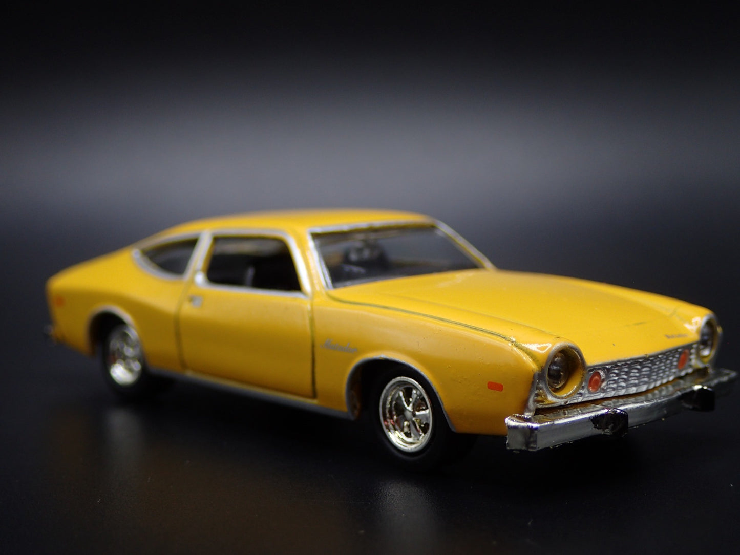 1975 75 AMC MATADOR YELLOW 1:64 SCALE COLLECTIBLE DIORAMA DIECAST MODEL CAR