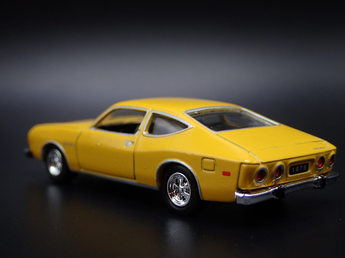 1975 75 AMC MATADOR YELLOW 1:64 SCALE COLLECTIBLE DIORAMA DIECAST MODEL CAR