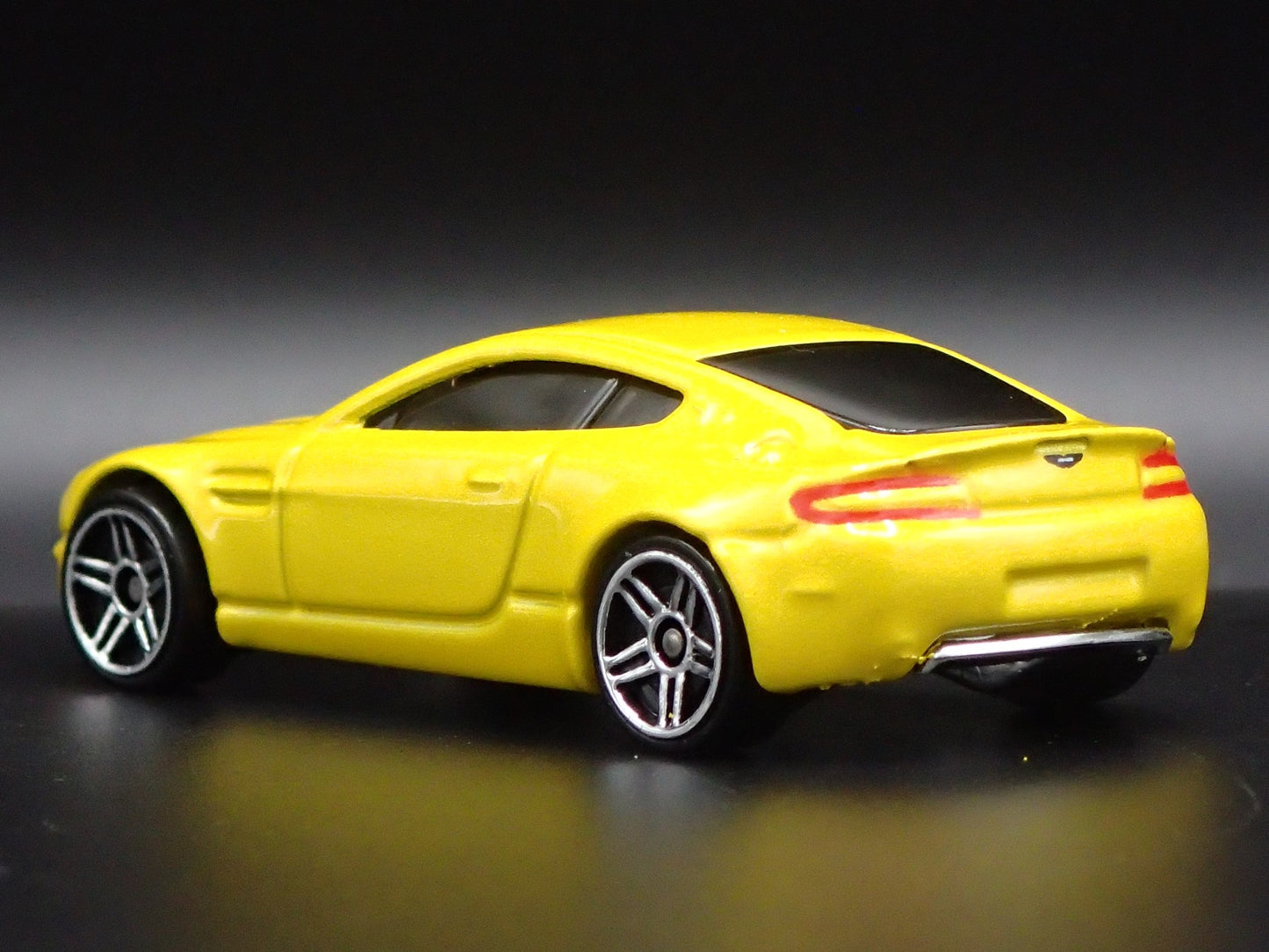 2006-2018 ASTON MARTIN V8 VANTAGE YELLOW 1/64 SCALE DIORAMA DIECAST MODEL CAR