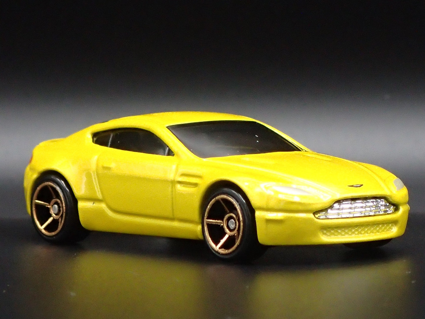 2006-2018 ASTON MARTIN V8 VANTAGE YELLOW 1/64 SCALE DIORAMA DIECAST MODEL CAR