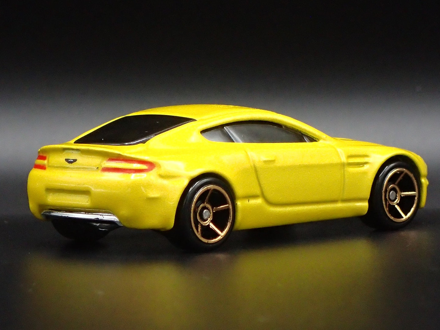 2006-2018 ASTON MARTIN V8 VANTAGE YELLOW 1/64 SCALE DIORAMA DIECAST MODEL CAR