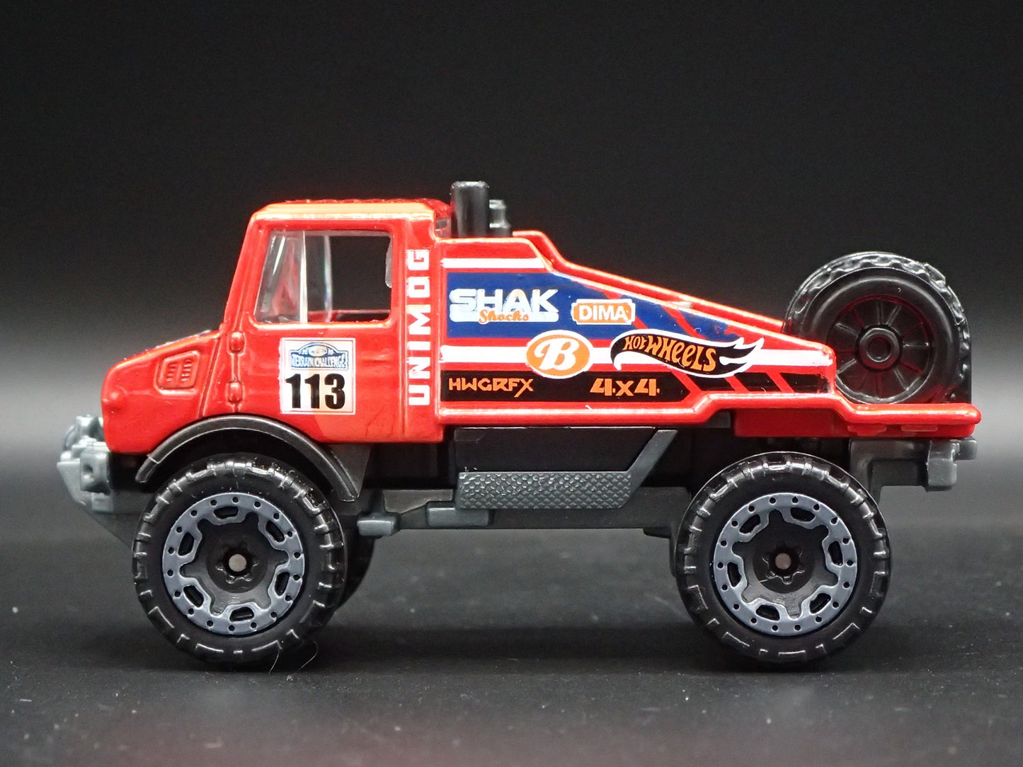 MERCEDES-BENZ UNIMOG 1300 UTILITY TRUCK RED 1:64 SCALE DIORAMA DIECAST MODEL CAR