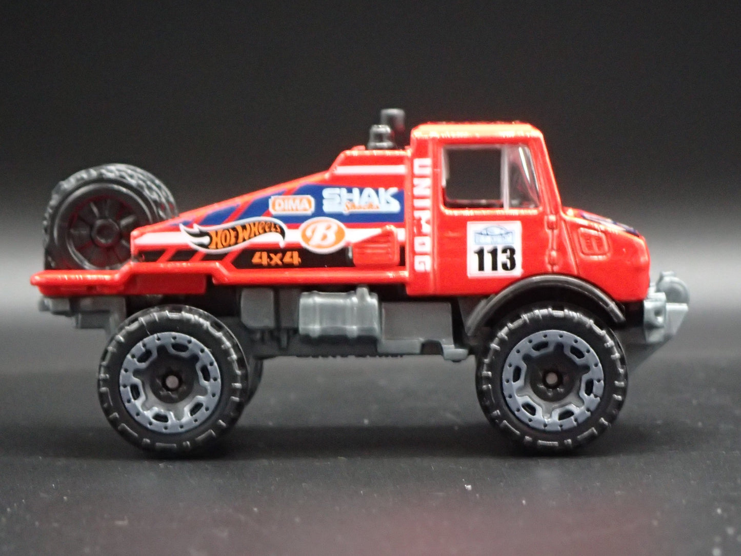 MERCEDES-BENZ UNIMOG 1300 UTILITY TRUCK RED 1:64 SCALE DIORAMA DIECAST MODEL CAR