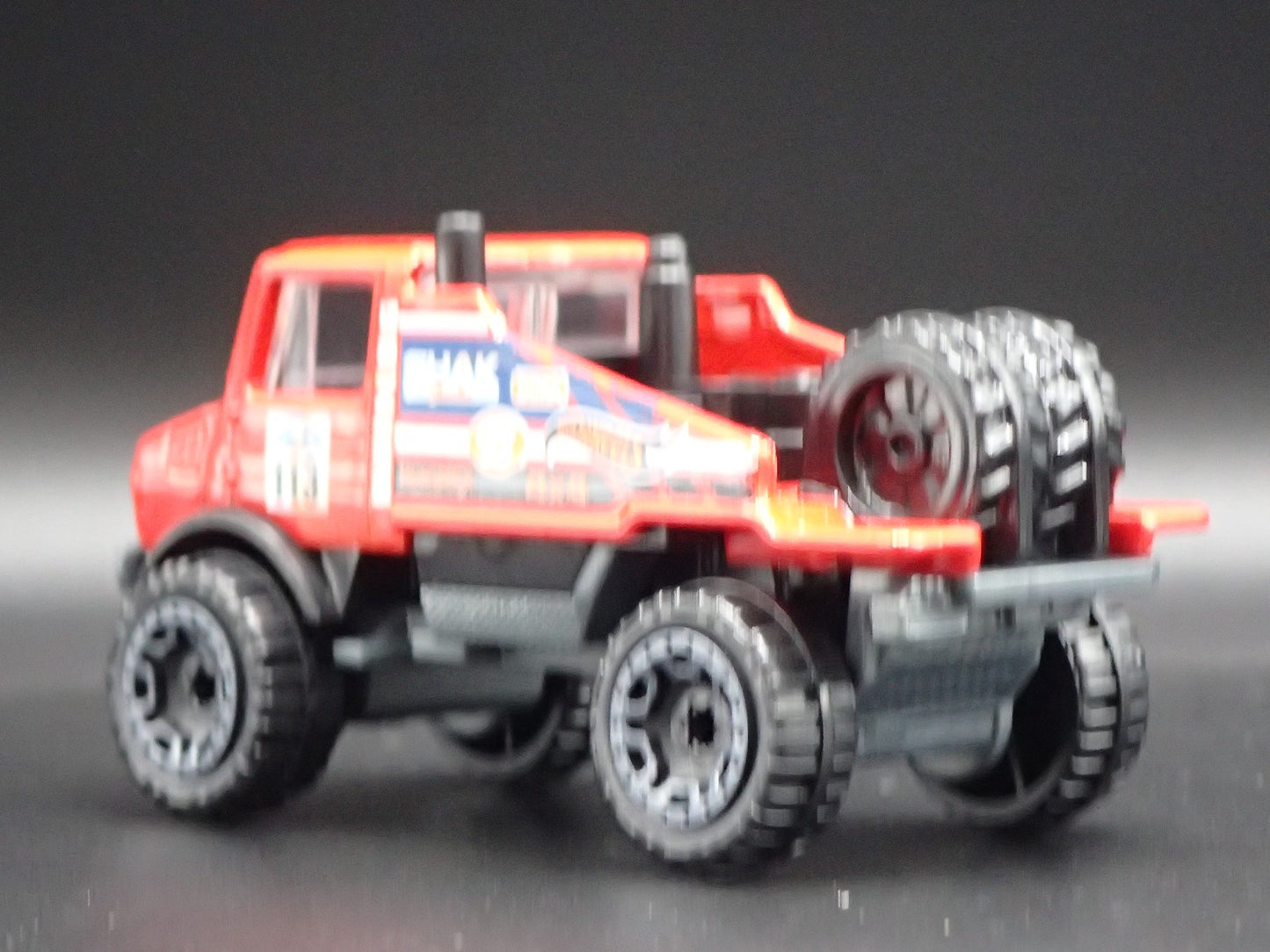 MERCEDES-BENZ UNIMOG 1300 UTILITY TRUCK RED 1:64 SCALE DIORAMA DIECAST MODEL CAR