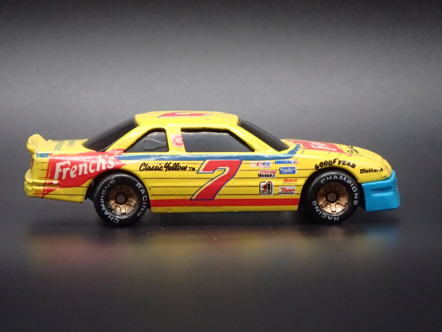 1991 CHEVY LUMINA #7 HARRY GANT FRENCHS NASCAR 1:64 SCALE DIECAST MODEL CAR