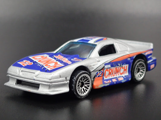 1996 96 FORD MUSTANG COBRA RACE CAR NESTLE CRUNCH  1:64 SCALE DIECAST MODEL CAR