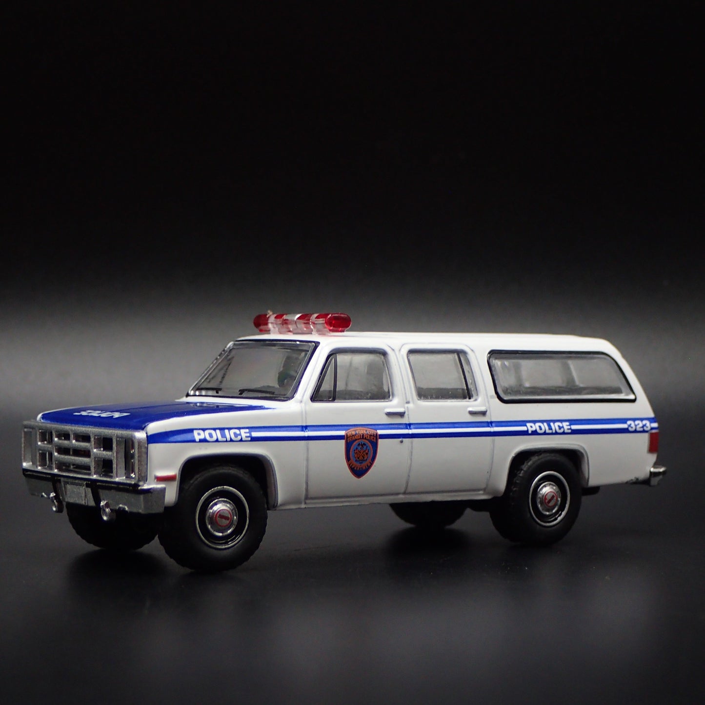 1973-1991 GMC SUBURBAN 2500 NYPD POLICE SQUAREBODY 1/64 SCALE DIECAST MODEL CAR