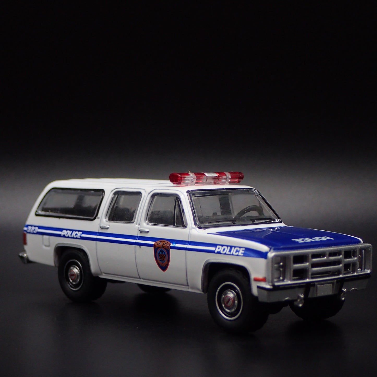 1973-1991 GMC SUBURBAN 2500 NYPD POLICE SQUAREBODY 1/64 SCALE DIECAST MODEL CAR