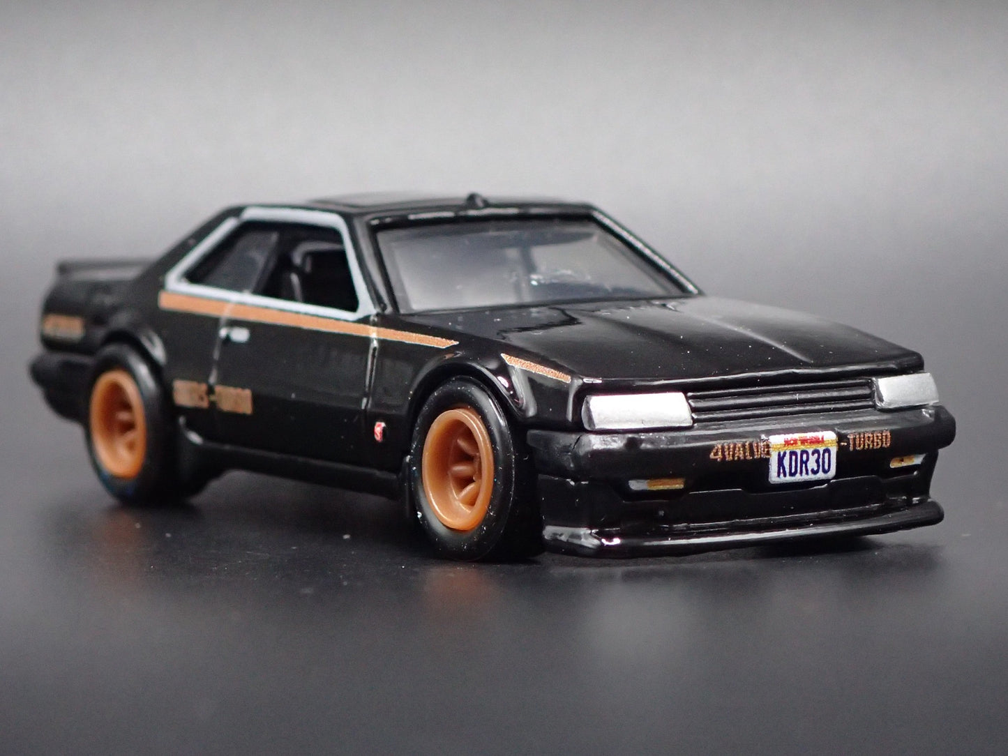 1981-1985 NISSAN SKYLINE RS KDR30 BLACK 1:64 SCALE COLLECTIBLE DIECAST MODEL CAR