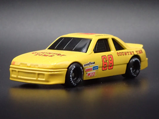 1991 91 OLDSMOBILE CUTLASS 68 BOBBY HAMILTON NASCAR 1:64 SCALE DIECAST CAR