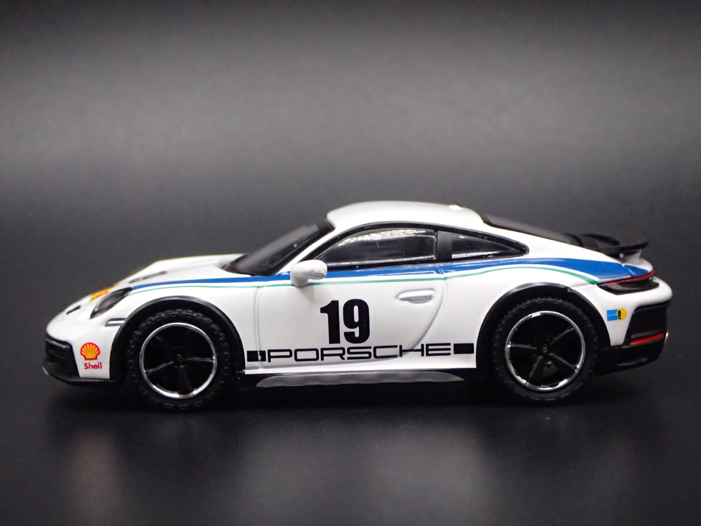 PORSCHE 911 DAKAR RALLYE OFF ROAD WHITE 1/64 SCALE COLLECTIBLE DIECAST MODEL CAR