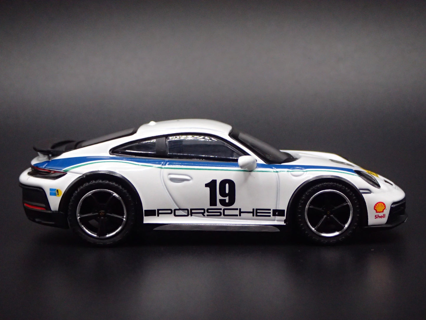PORSCHE 911 DAKAR RALLYE OFF ROAD WHITE 1/64 SCALE COLLECTIBLE DIECAST MODEL CAR