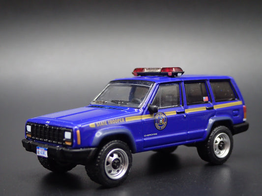 JEEP CHEROKEE XJ SPORT 4 DOOR NEW YORK STATE TROOPER 1:64 DIECAST MODEL CAR