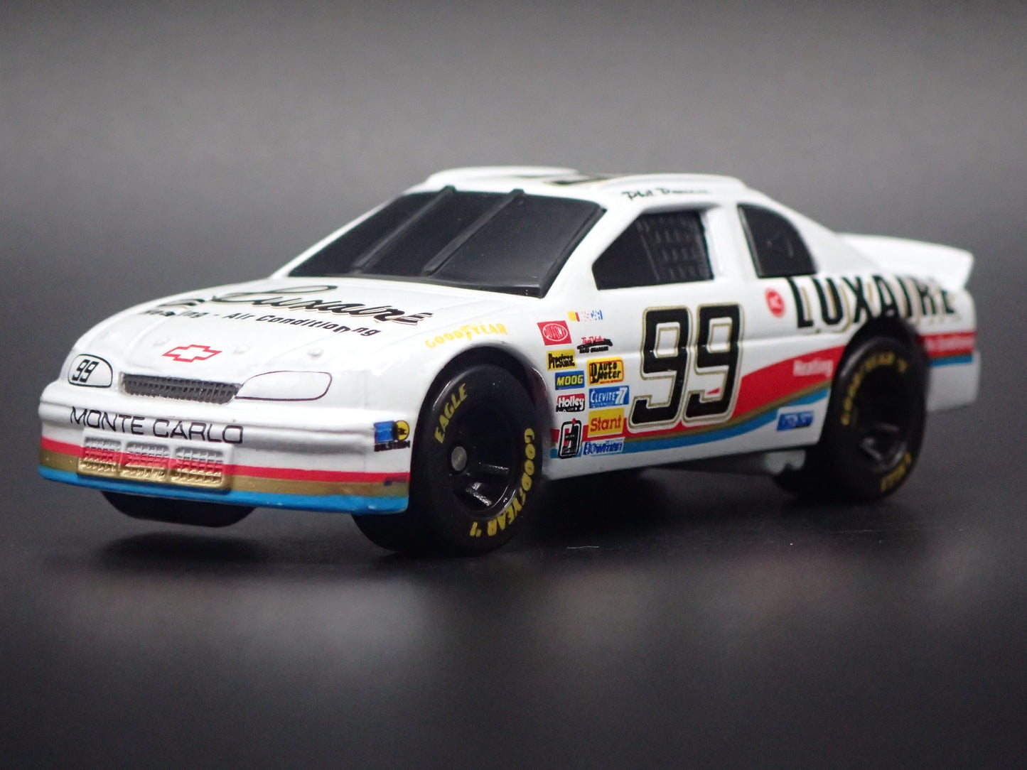1995 CHEVROLET MONTE CARLO 99 PHIL PARSONS NASCAR 1:64 SCALE DIECAST MODEL CAR