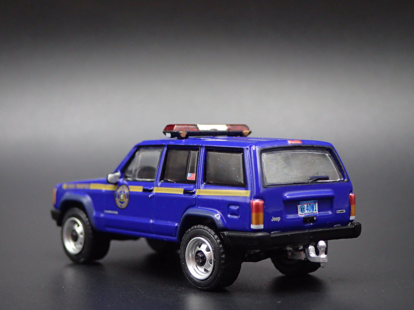 JEEP CHEROKEE XJ SPORT 4 DOOR NEW YORK STATE TROOPER 1:64 DIECAST MODEL CAR
