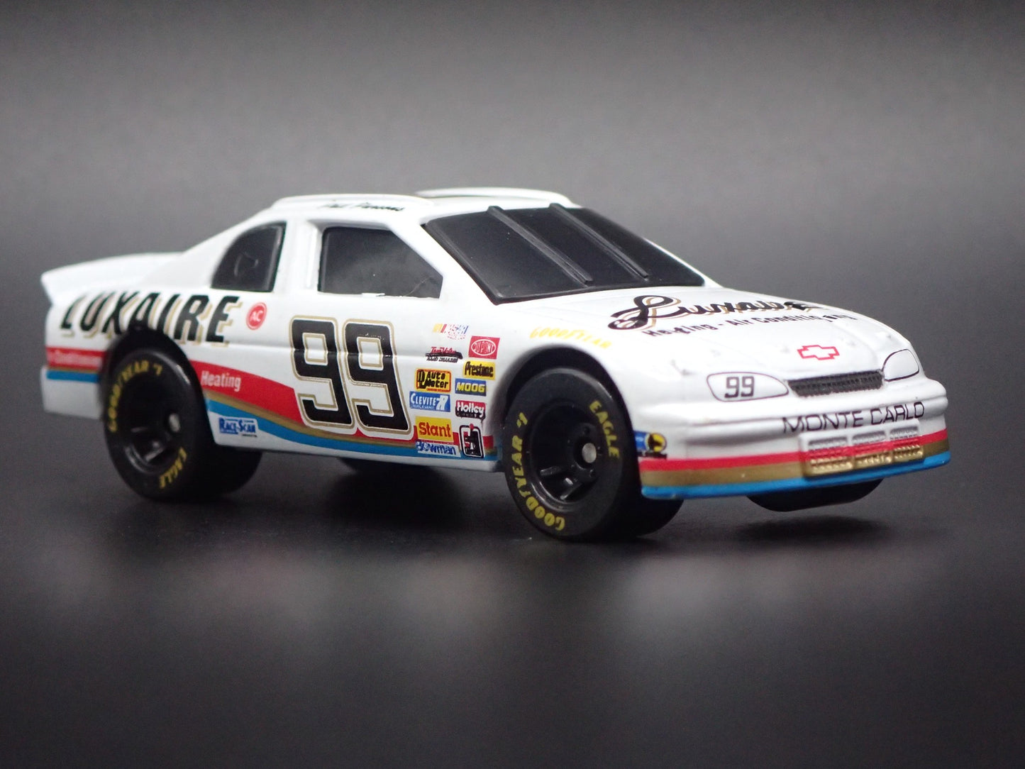 1995 CHEVROLET MONTE CARLO 99 PHIL PARSONS NASCAR 1:64 SCALE DIECAST MODEL CAR