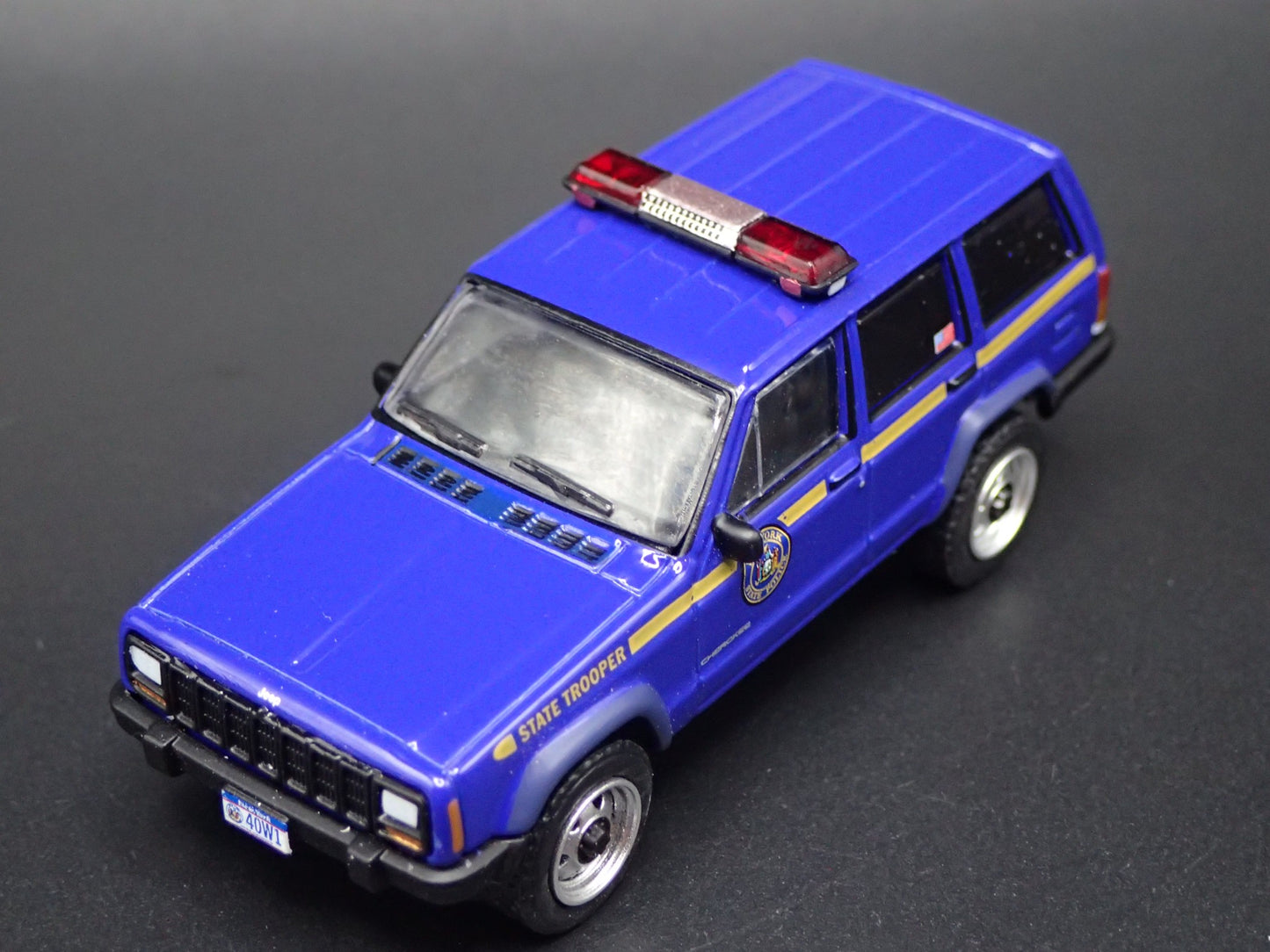 JEEP CHEROKEE XJ SPORT 4 DOOR NEW YORK STATE TROOPER 1:64 DIECAST MODEL CAR