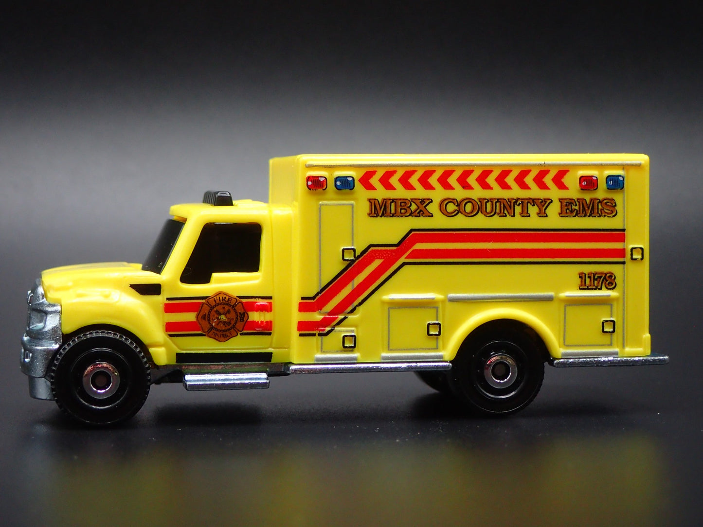 INTERNATIONAL WORKSTAR AMBULANCE MBX COUNTY EMS 1:64 MB SCALE DIECAST MODEL CAR