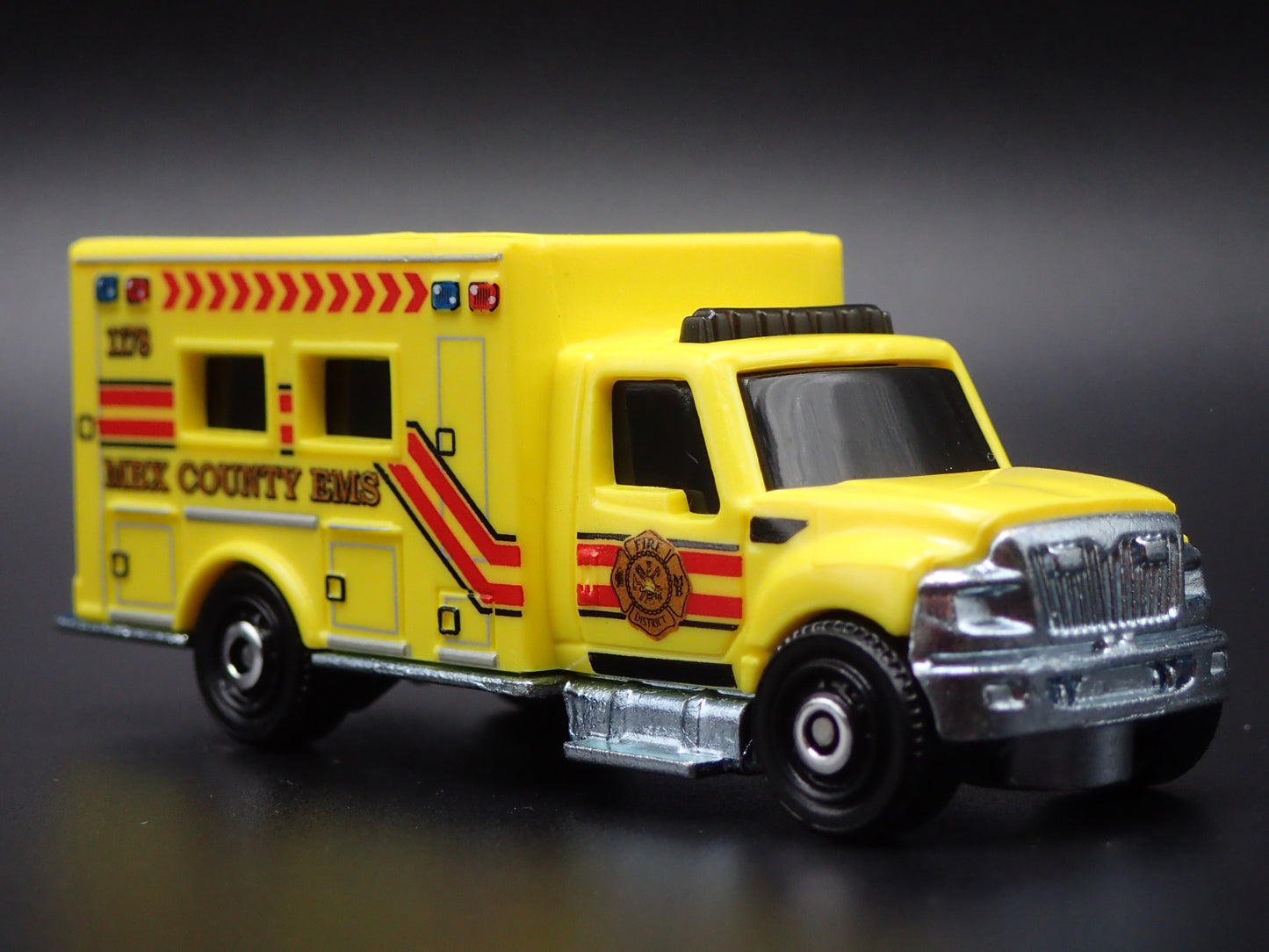 INTERNATIONAL WORKSTAR AMBULANCE MBX COUNTY EMS 1:64 MB SCALE DIECAST MODEL CAR