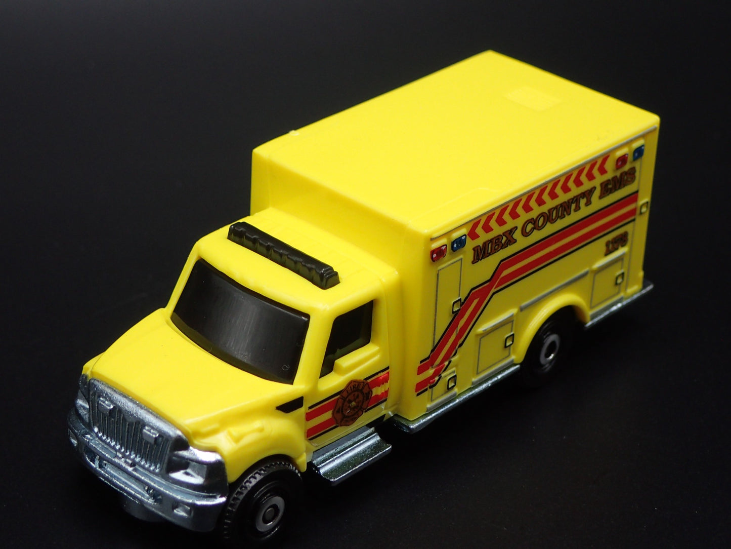 INTERNATIONAL WORKSTAR AMBULANCE MBX COUNTY EMS 1:64 MB SCALE DIECAST MODEL CAR