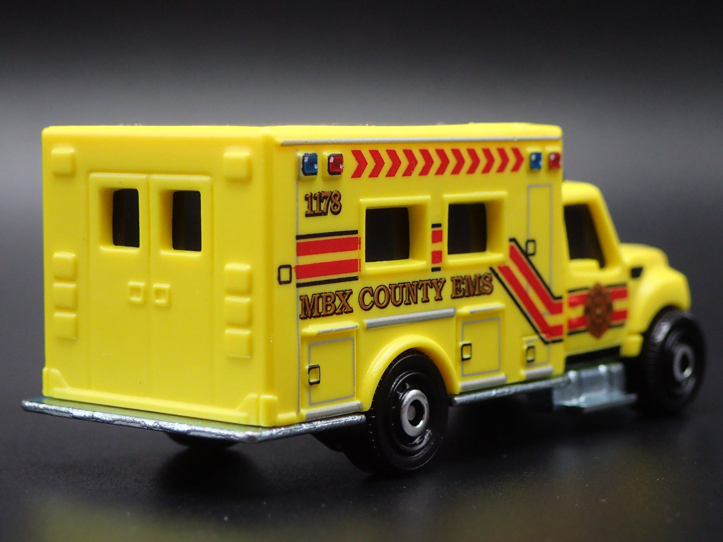 INTERNATIONAL WORKSTAR AMBULANCE MBX COUNTY EMS 1:64 MB SCALE DIECAST MODEL CAR