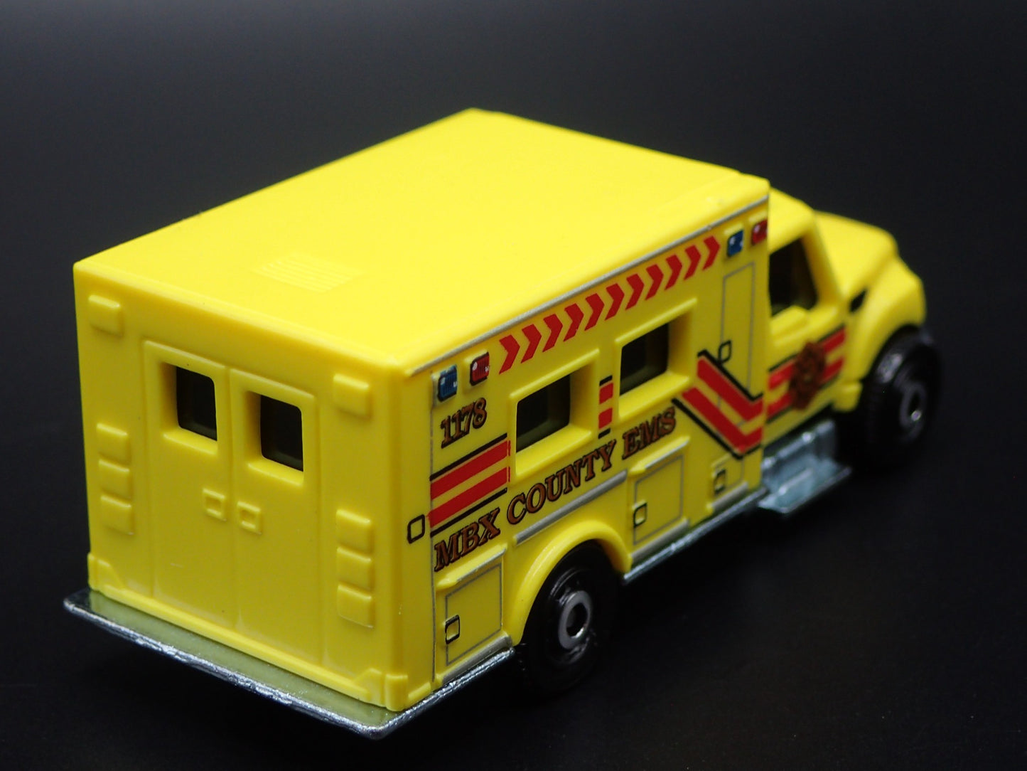 INTERNATIONAL WORKSTAR AMBULANCE MBX COUNTY EMS 1:64 MB SCALE DIECAST MODEL CAR