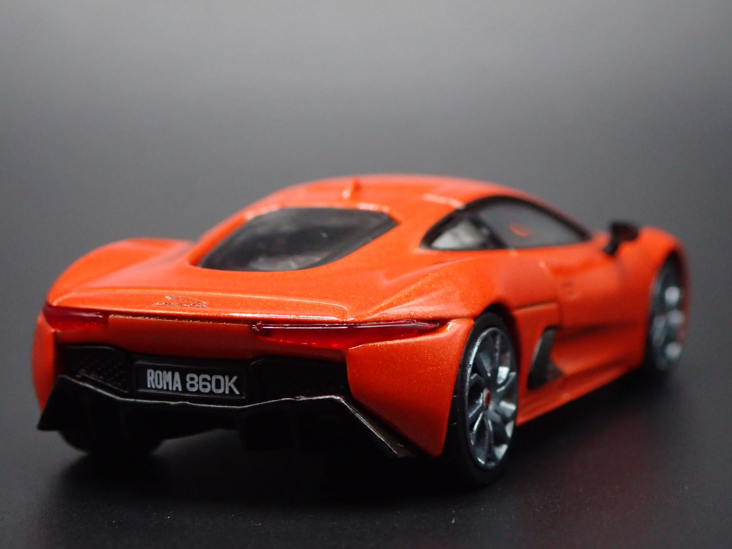 2010-2013 JAGUAR CX75 JAMES BOND 007 SPECTRE ORANGE 1:64 SCALE DIECAST MODEL CAR