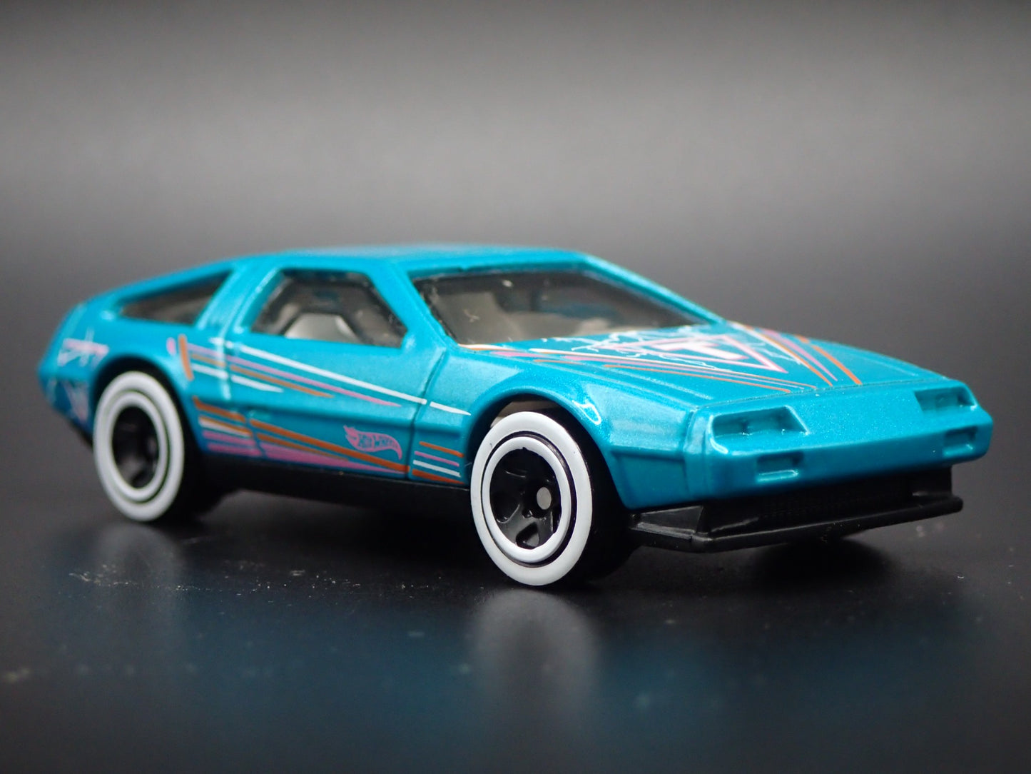 1981-1983 DMC DELOREAN TEAL 1:64 SCALE COLLECTIBLE DIORAMA DIECAST MODEL CAR