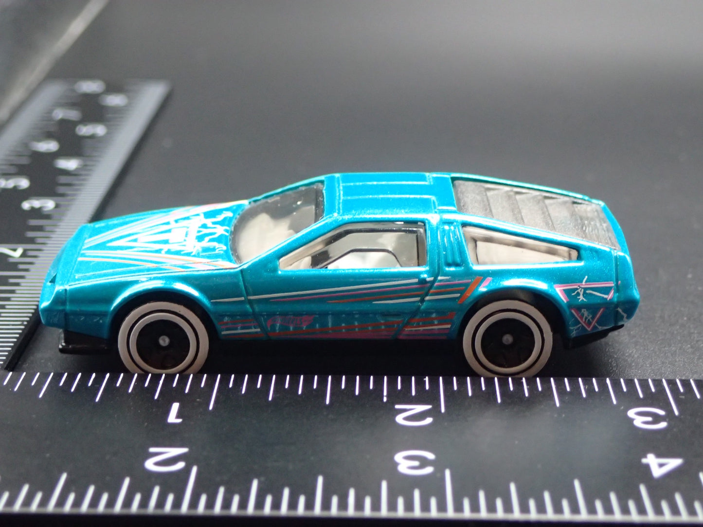 1981-1983 DMC DELOREAN TEAL 1:64 SCALE COLLECTIBLE DIORAMA DIECAST MODEL CAR