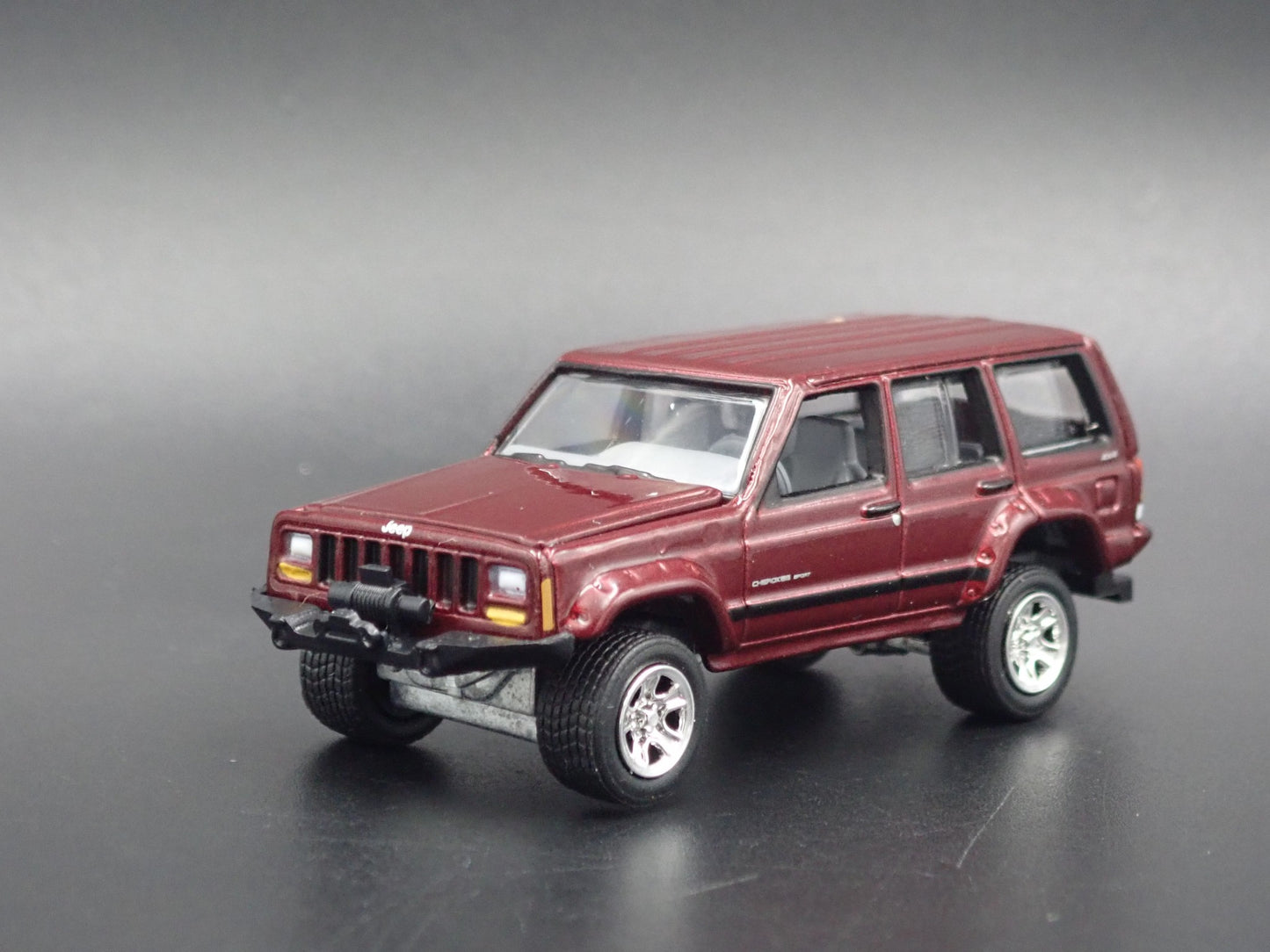 1984-2001 JEEP CHEROKEE XJ SPORT 4 DOOR W/ HITCH 1:64 SCALE DIECAST MODEL CAR