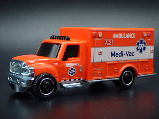 INTERNATIONAL TERRASTAR AMBULANCE MEDI-VAC ORG 1/64 MB SCALE DIECAST MODEL CAR