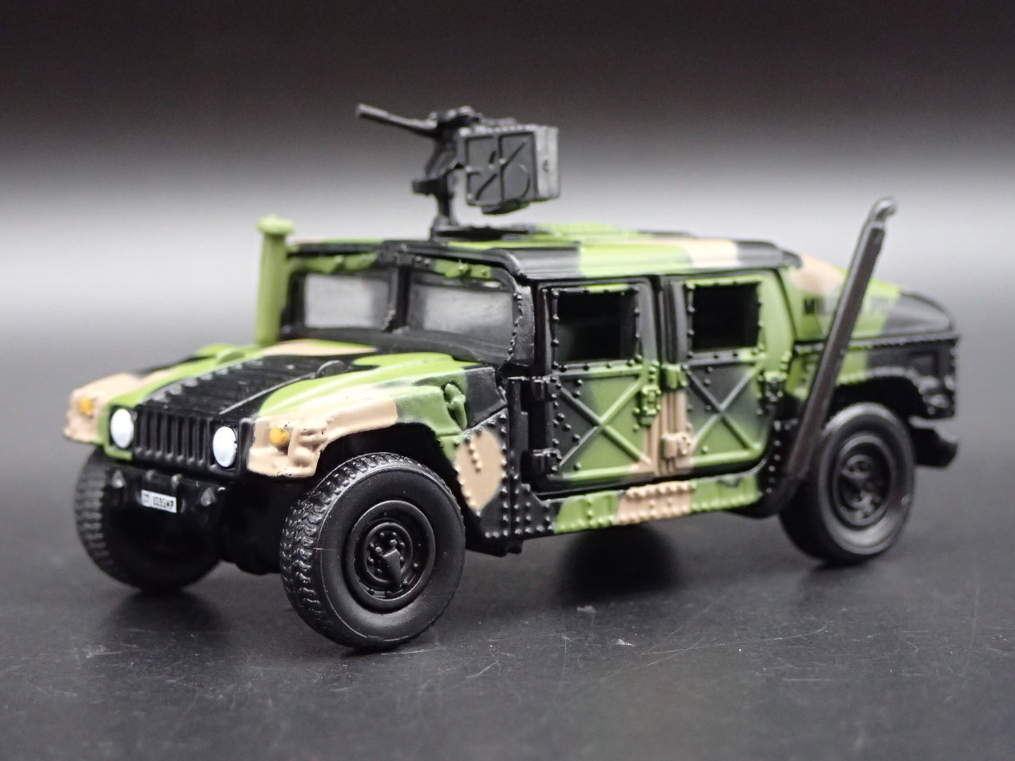 H1 M1025 HMMWV ARMAMENT CARRIER HUMVEE MILITARY U.N 1:64 SCALE DIECAST MODEL CAR