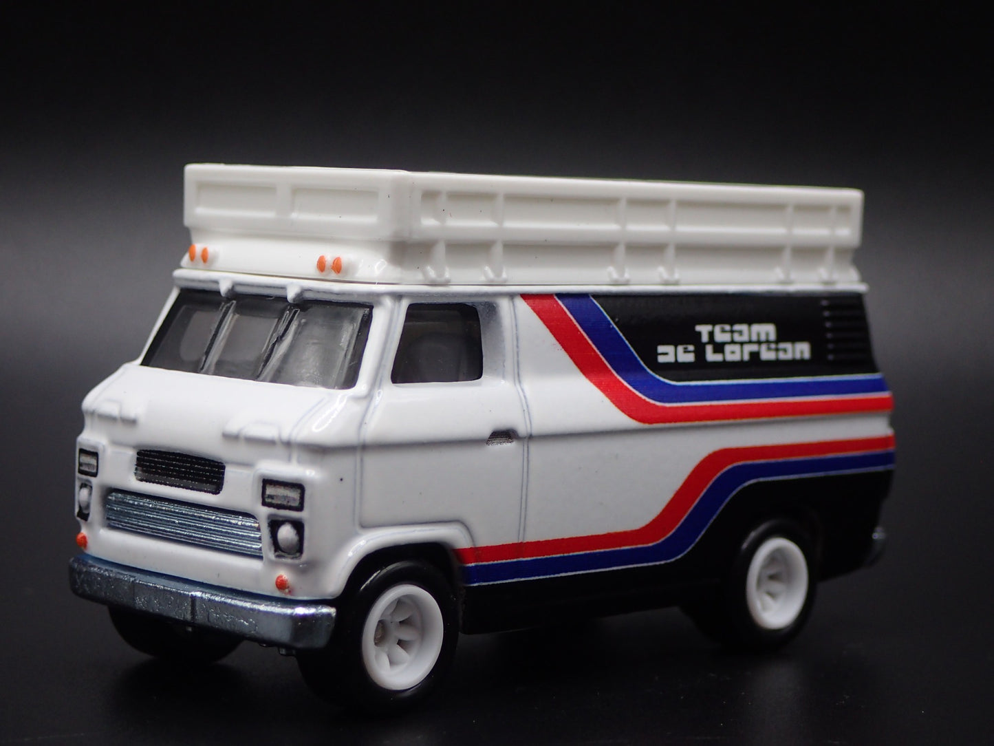 1965-1977 FORD TRANSIT SUPER VAN DELOREAN RACING 1:64 SCALE DIECAST MODEL CAR