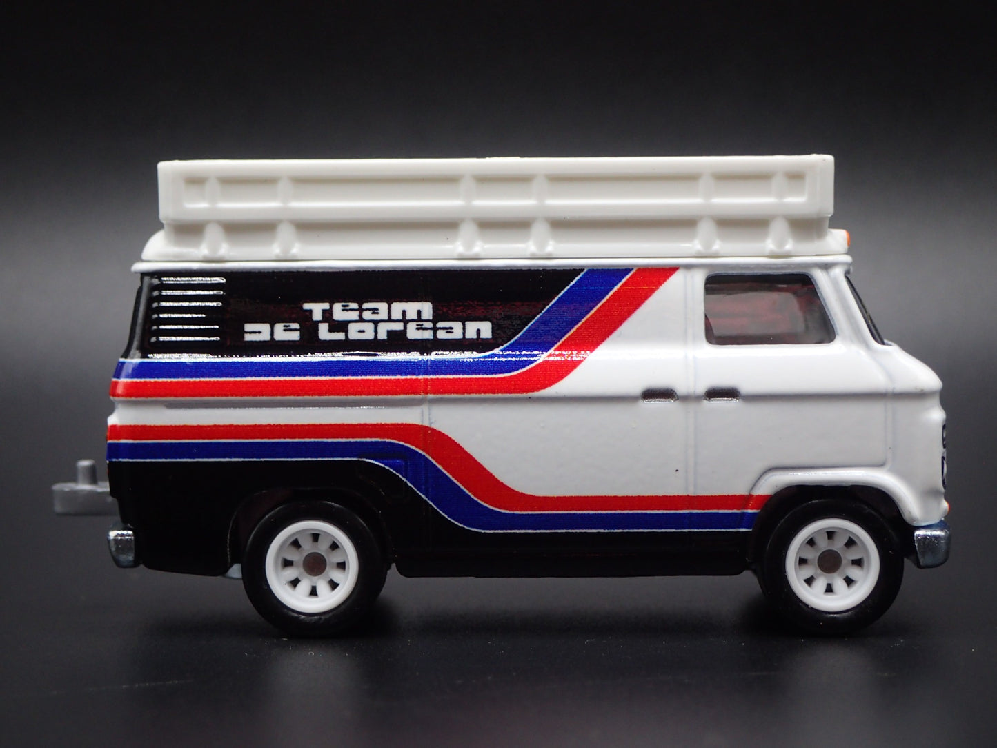 1965-1977 FORD TRANSIT SUPER VAN DELOREAN RACING 1:64 SCALE DIECAST MODEL CAR