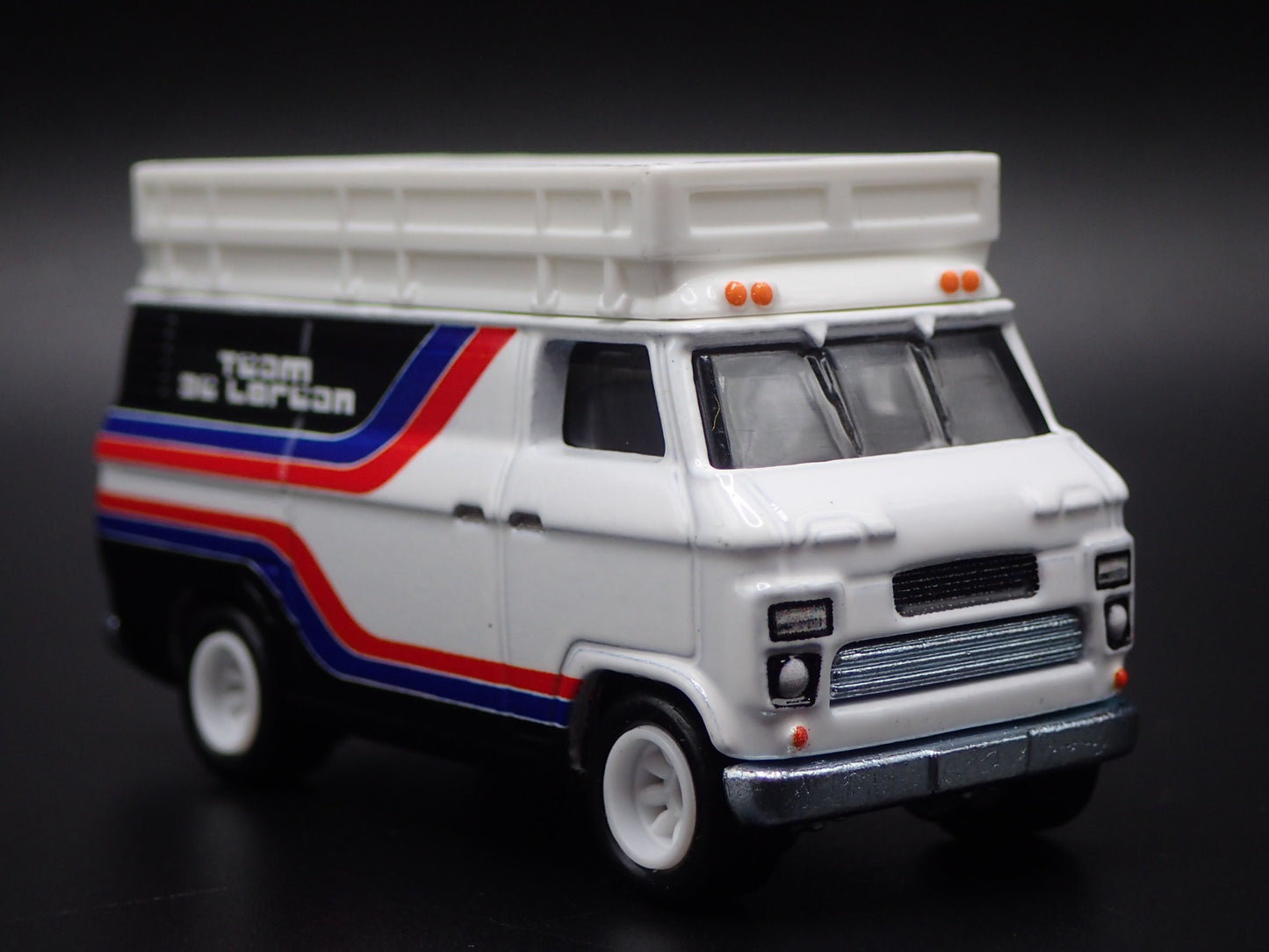 1965-1977 FORD TRANSIT SUPER VAN DELOREAN RACING 1:64 SCALE DIECAST MODEL CAR