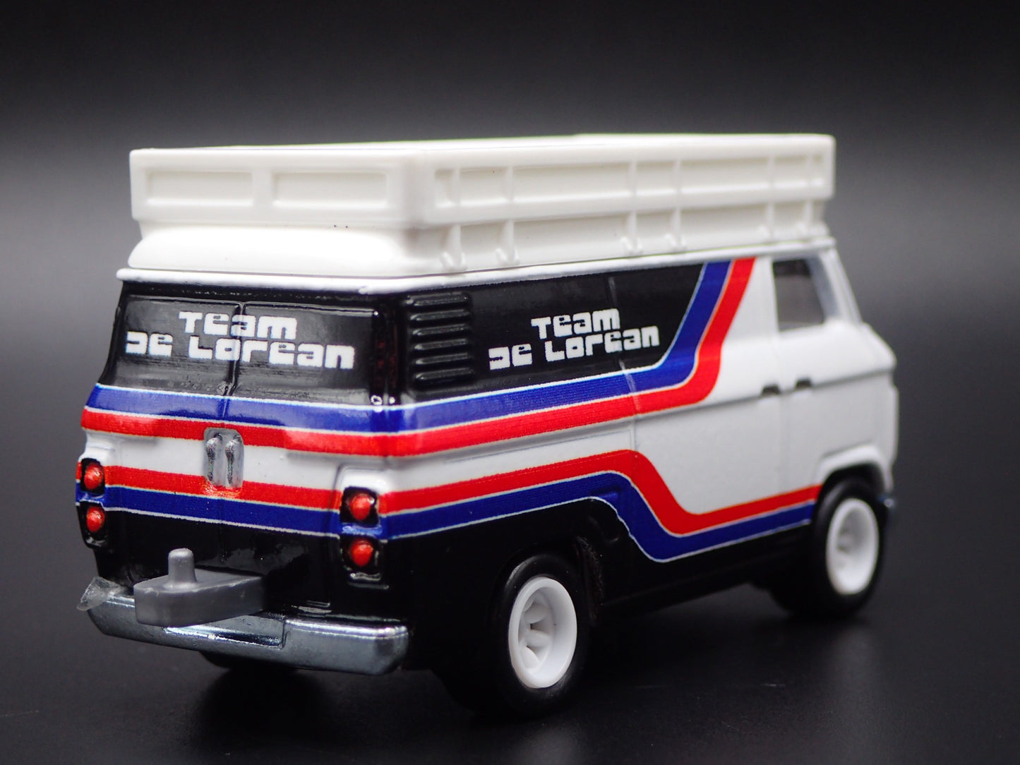 1965-1977 FORD TRANSIT SUPER VAN DELOREAN RACING 1:64 SCALE DIECAST MODEL CAR