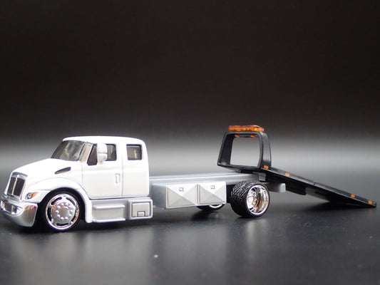 INTERNATIONAL DURASTAR FLATBED TOW TRUCK WRECKER 1/64 SCALE DIECAST MODEL CAR