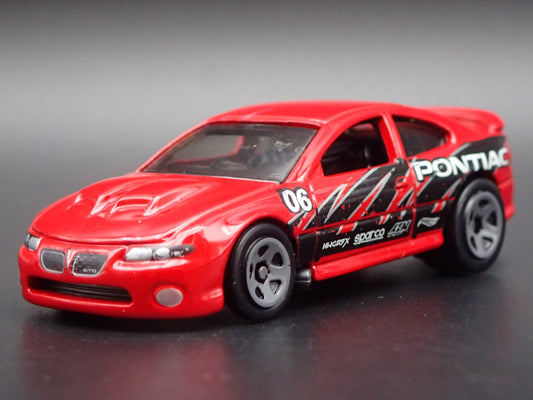 2004-2006 PONTIAC GTO RED RARE 1:64 SCALE COLLECTIBLE DIORAMA DIECAST MODEL CAR