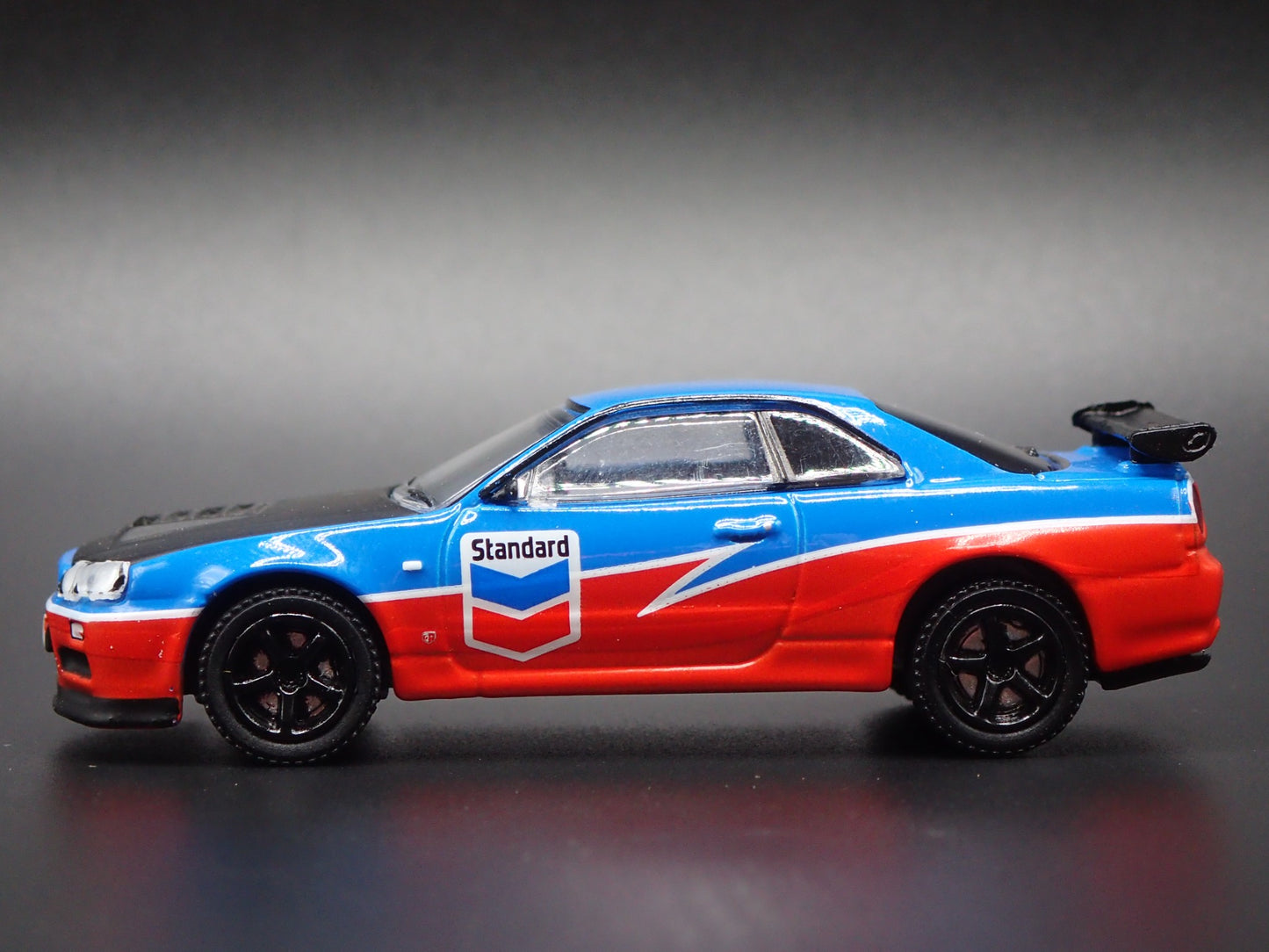 1999-2002 NISSAN SKYLINE GTR R34 STANDARD CHEVRON 1:64 SCALE DIECAST MODEL CAR