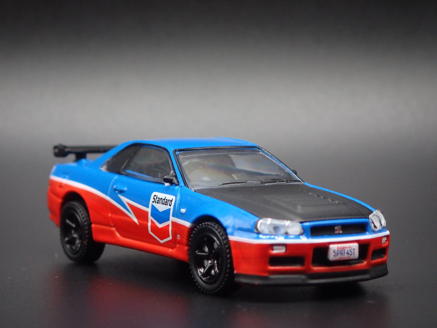 1999-2002 NISSAN SKYLINE GTR R34 STANDARD CHEVRON 1:64 SCALE DIECAST MODEL CAR