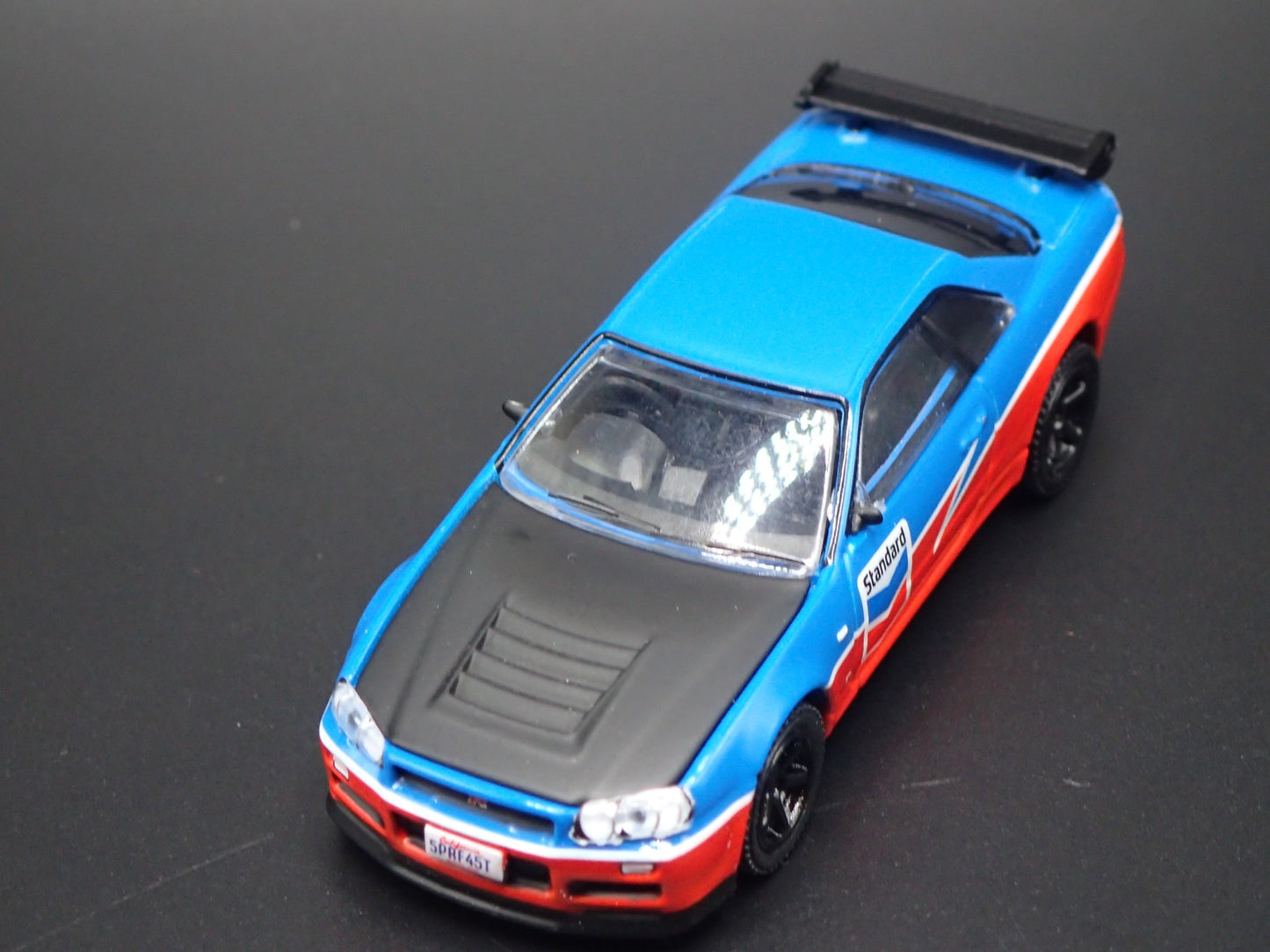 1999-2002 NISSAN SKYLINE GTR R34 STANDARD CHEVRON 1:64 SCALE DIECAST MODEL CAR