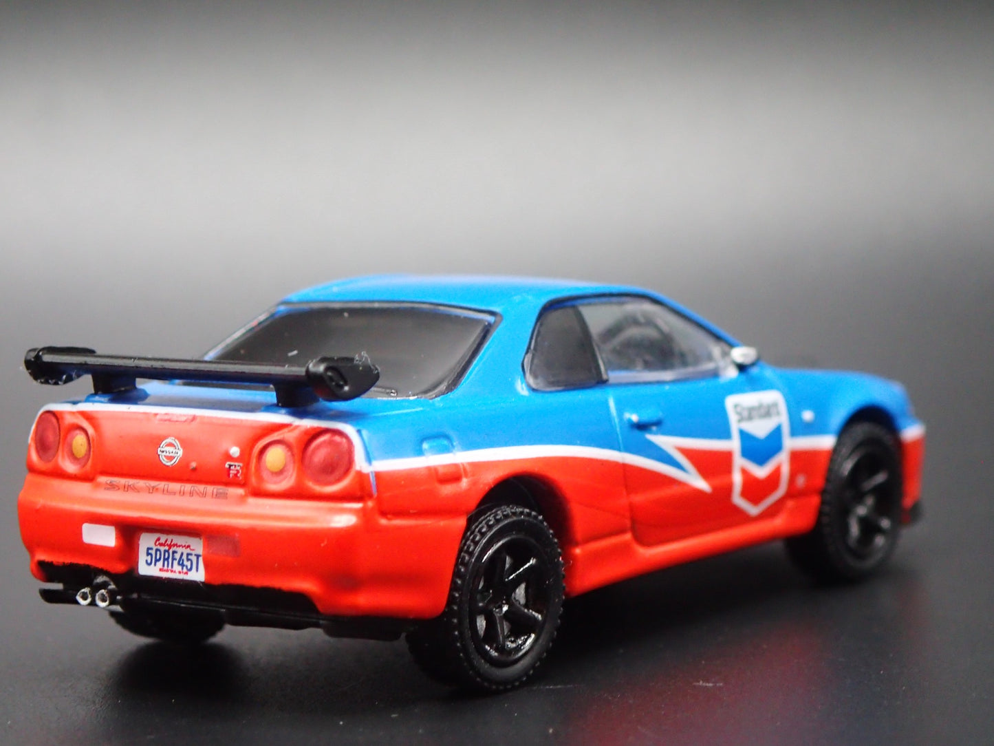 1999-2002 NISSAN SKYLINE GTR R34 STANDARD CHEVRON 1:64 SCALE DIECAST MODEL CAR