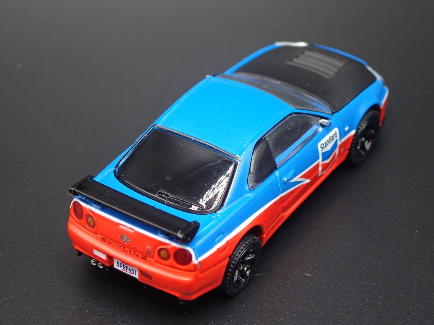 1999-2002 NISSAN SKYLINE GTR R34 STANDARD CHEVRON 1:64 SCALE DIECAST MODEL CAR
