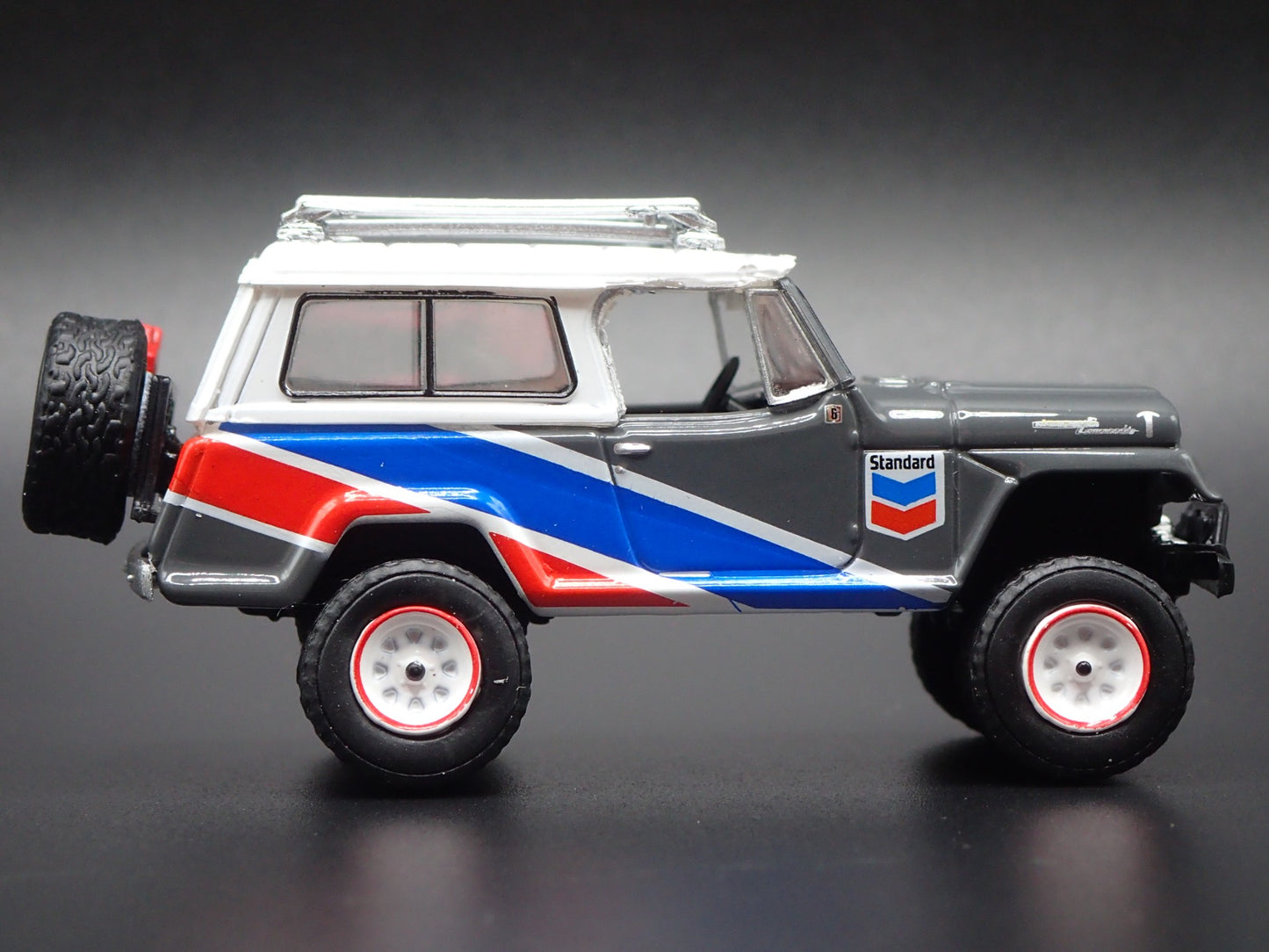1966 - 1973 JEEP JEEPSTER COMMANDO CHEVRON GRAY 1:64 SCALE DIECAST MODEL CAR
