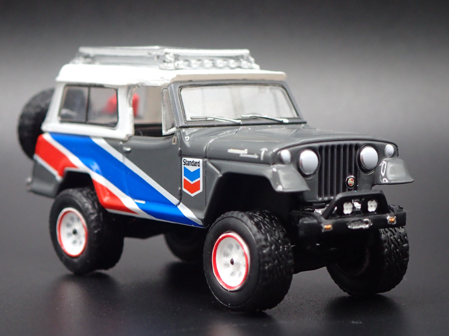 1966 - 1973 JEEP JEEPSTER COMMANDO CHEVRON GRAY 1:64 SCALE DIECAST MODEL CAR